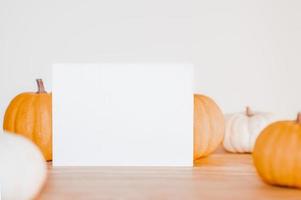 Three pumpkins in autumn photo