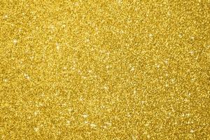 Abstract gold glitter sparkle background photo