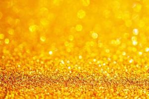 gold glitter sparkle with bokeh background photo