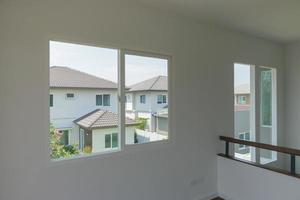 Empty room with glass window frame house interior on concrete wall photo