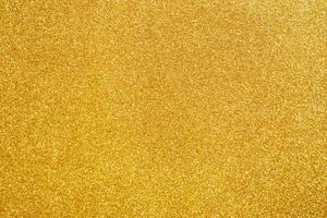 Abstract gold glitter sparkle texture background photo