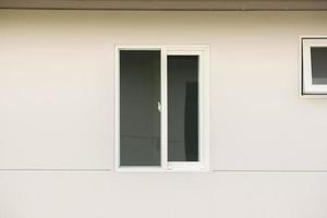 Modern window frame outside the house photo