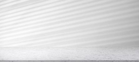 Marble table with window shadow drop on white wall background for mockup product display photo