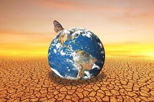changing the environment globe on a barren land photo