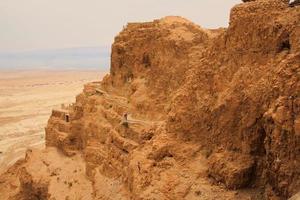 A view of the Hilltop fortress of Massada in Israel photo