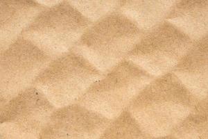 Brown eco recycled cardboard paper sheet texture background photo