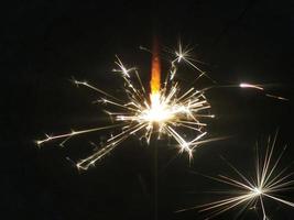 sparkling fireworks on a black background photo