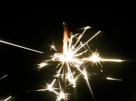 sparkling fireworks on a black background photo