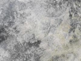 old cement background with rough texture photo