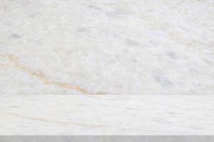white marble table with natural wall texture background for mockup product display template photo