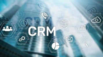 CRM, Customer relationship management system concept on abstract blurred background. photo