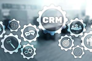 CRM Customer Management Analysis Service Concept. Graphics on blurred office background. photo