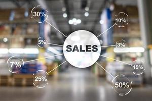 Sale discount concept. Inscription Sales on blurred shop background. photo