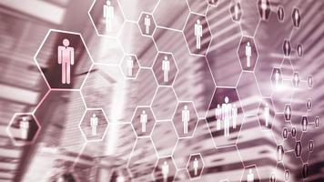 3d Digital composite image of people icons on office buildings background. photo