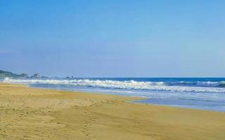 Extremely huge big surfer waves at beach Puerto Escondido Mexico. photo