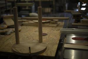 Chair in carpentry workshop. Creation of furniture. Production of wood. photo