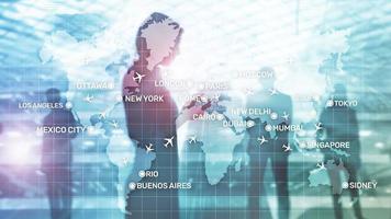 Aviation wallpaper with planes over the map with major city names. Digital map with planes around the world concept photo