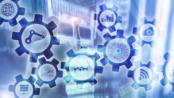 Automation technology and smart industry concept on blurred abstract background. Gears and icons. photo