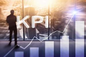 KPI - Key Performance Indicator. Business and technology concept. Multiple exposure, mixed media. Financial concept on blurred background. photo