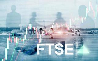 FTSE 100 Financial Times Stock Exchange Index United Kingdom UK England Investment Trading concept with chart and graphs. photo