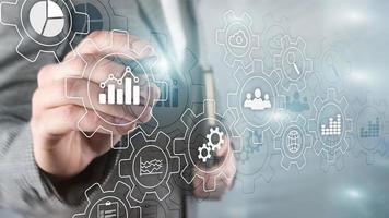 Workflow and automation technology concept. Business process abstract diagram with gears and icons. photo
