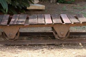 Old agricultural machinery stands on the street in Israel and rusts photo