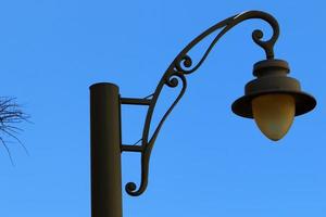 Lantern to illuminate the city street at night. photo