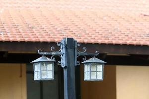 Lantern to illuminate the city street at night. photo