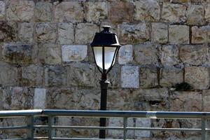 Lantern to illuminate the city street at night. photo