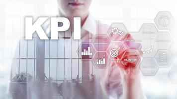 KPI - Key Performance Indicator. Business and technology concept. Multiple exposure, mixed media. Financial concept on blurred background. photo