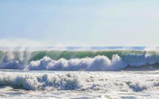 Extremely huge big surfer waves at beach Puerto Escondido Mexico. photo