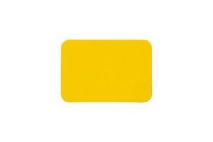 Yellow plastic sticker label isolated on white background photo