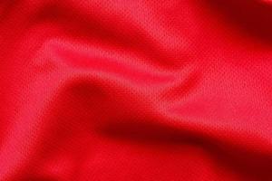 Red sports clothing fabric football shirt jersey texture background photo