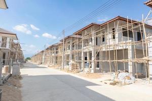 construction residential new house in progress at building site housing estate development photo