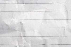 Blank crumpled lined notebook paper texture background photo