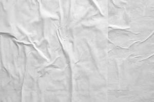 white crumpled and creased paper poster texture background photo