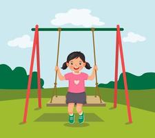 cute little girl swinging and having fun on rope wooden swing in playground vector