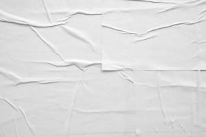 white crumpled and creased paper poster texture background photo