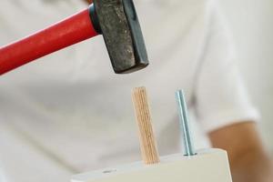 Man assembling furniture at home photo