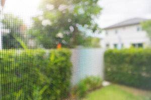 mosquito net wire screen on house window protection against insect photo