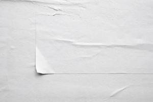 white crumpled and creased paper poster texture background photo