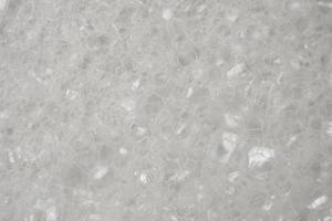 Abstract white soap foam texture background close up photo