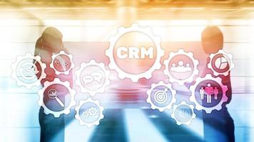 CRM, Customer relationship management system concept on abstract blurred background. photo