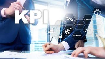 KPI - Key Performance Indicator. Business and technology concept. Multiple exposure, mixed media. Financial concept on blurred background photo