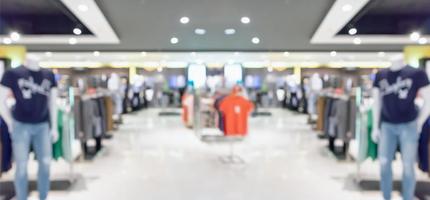 Abstract blur clothing boutique display interior of shopping mall background photo