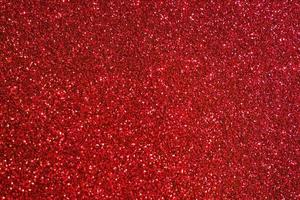 Red glitter texture abstract background photo