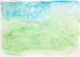 Abstract green and blue watercolor paint background texture close up photo