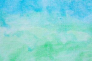 Abstract green and blue watercolor paint background texture close up photo