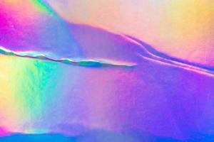 Crumpled Holographic rainbow foil iridescent texture abstract hologram background photo