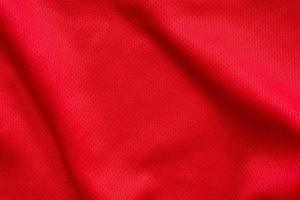 Red sports clothing fabric football shirt jersey texture background photo